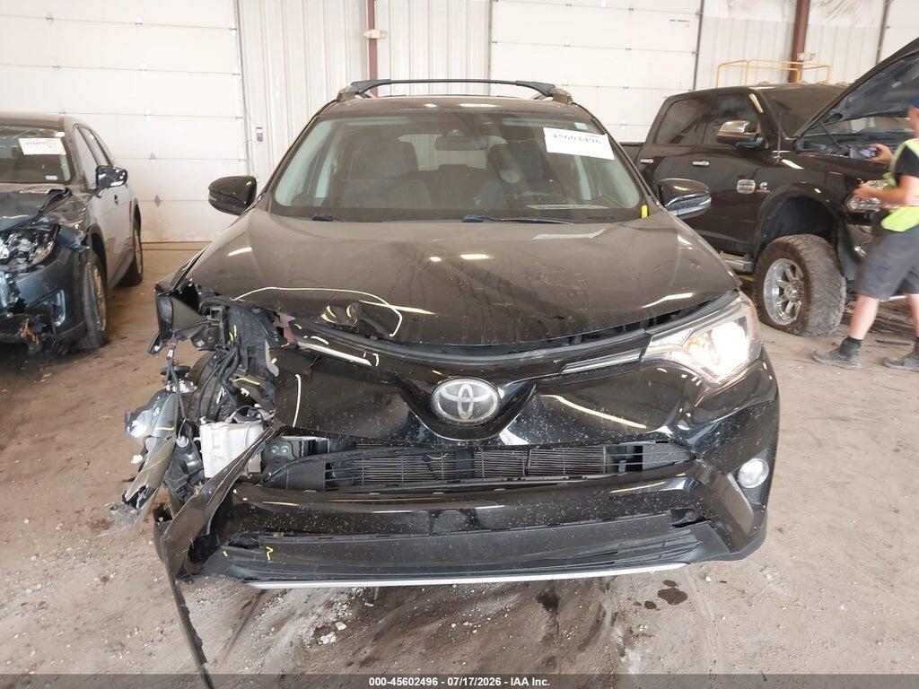 2T3RFREV8JW732159 2018 TOYOTA RAV4 photo no. 12