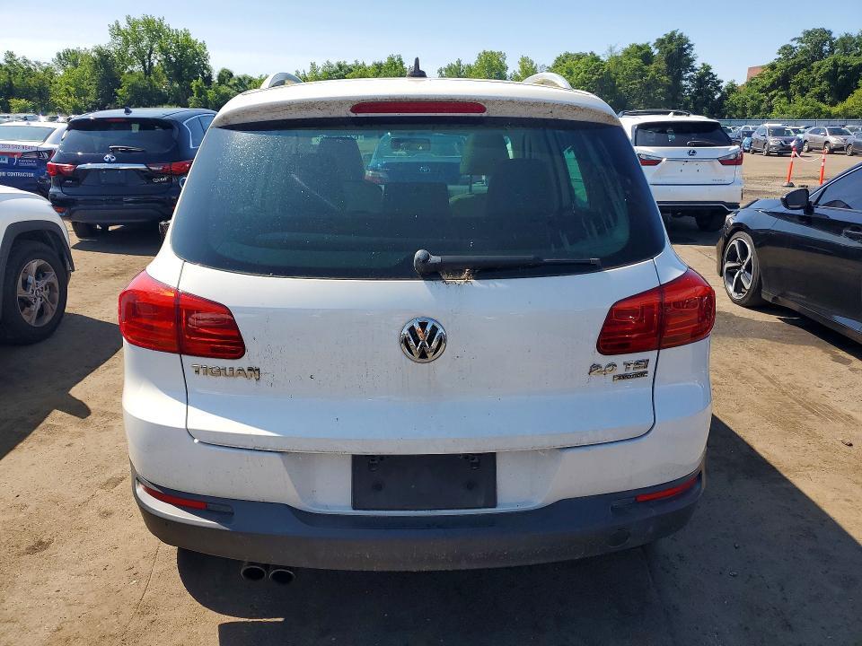 2014 VOLKSWAGEN TIGUAN S — Фото 6 из 13