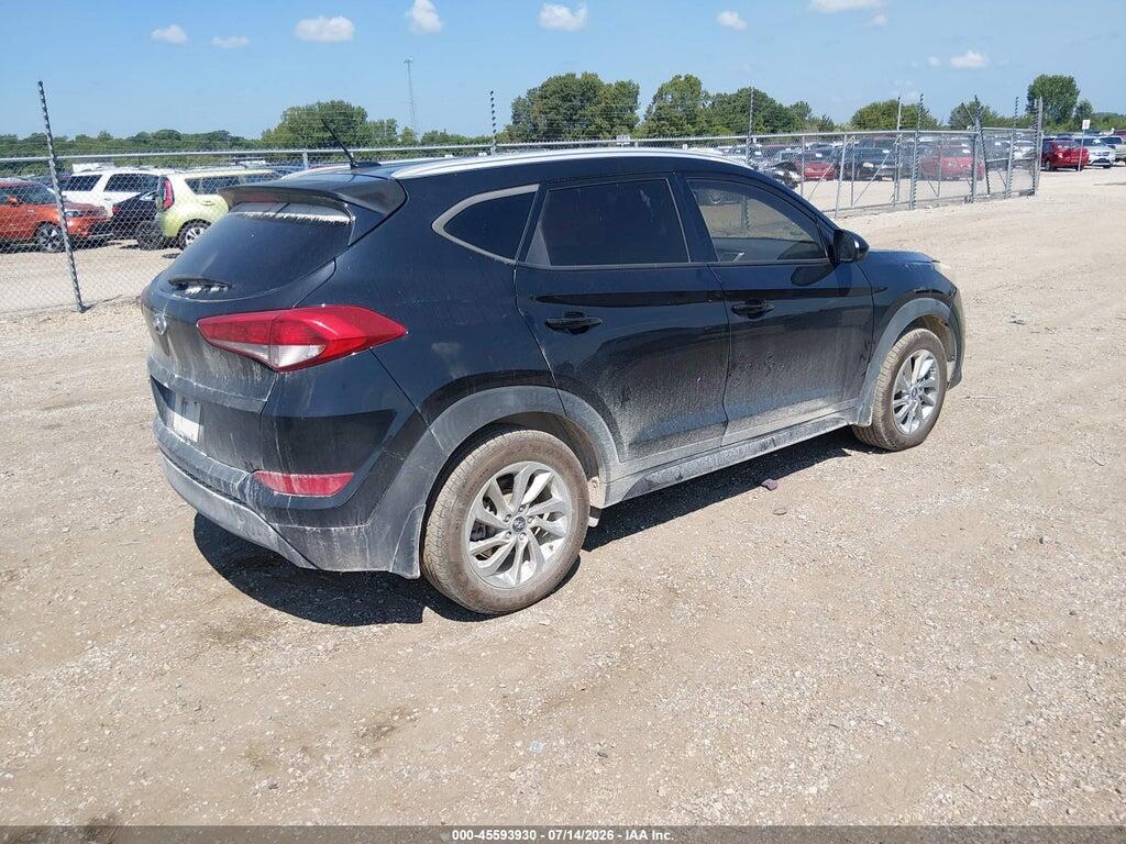 KM8J33A41GU161311 2016 HYUNDAI TUCSON photo no. 4