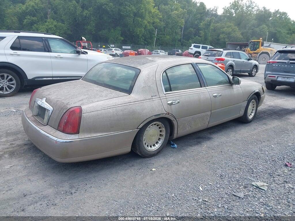 1LNHM81W11Y733634 2001 LINCOLN TOWN CAR photo no. 4