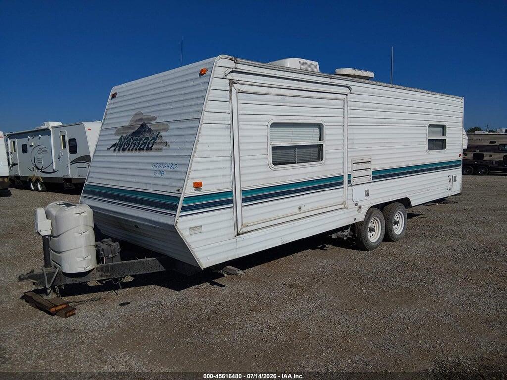 1SN200N201F002034 2001 NOMAD SCOUT photo no. 2