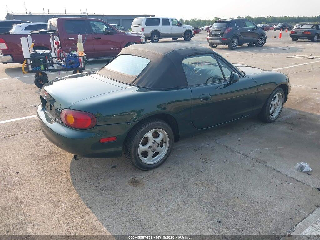 JM1NB3537X0111739 1999 MAZDA MX-5 MIATA photo no. 4