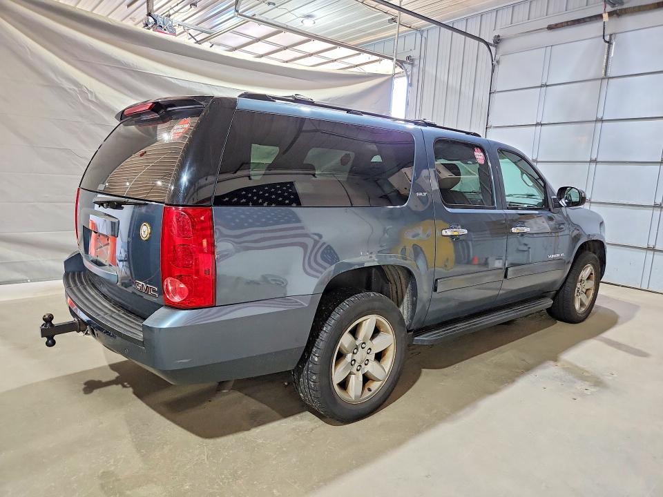 2010 GMC YUKON XL K1500 SLT — Фото 3 из 13