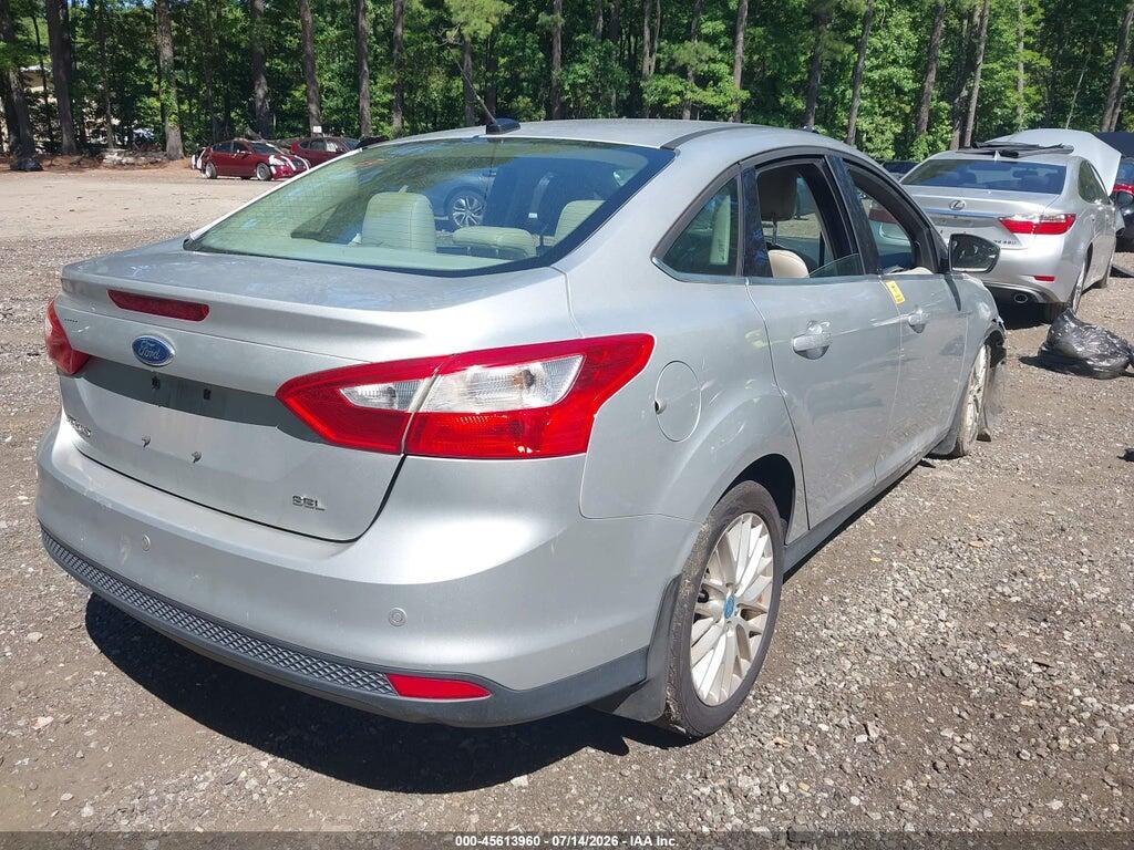 1FAHP3H29CL172963 2012 FORD FOCUS photo no. 4