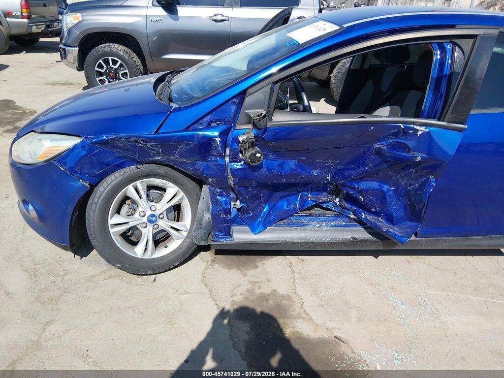 1FAHP3F27CL267802 2012 FORD FOCUS photo no. 6