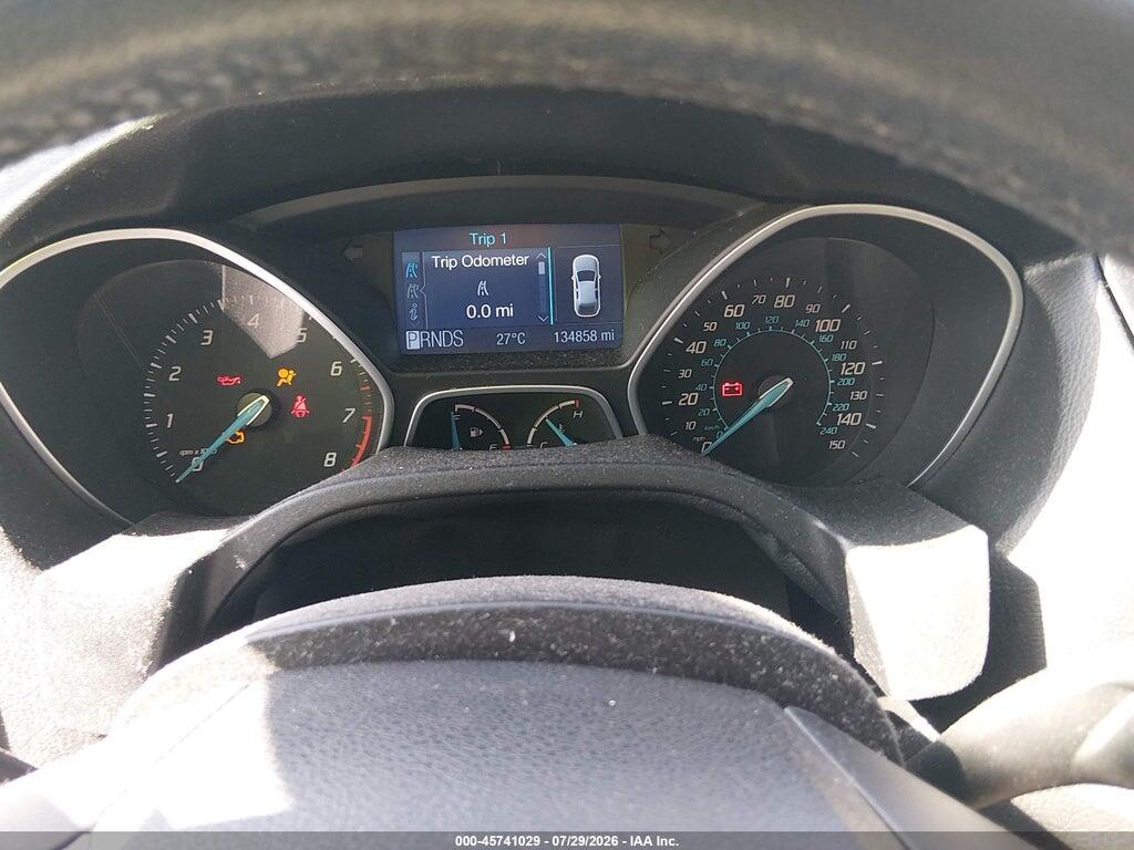 1FAHP3F27CL267802 2012 FORD FOCUS photo no. 7