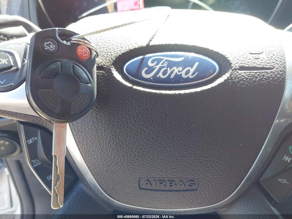 1FAHP3F23CL452848 2012 FORD FOCUS photo no. 11