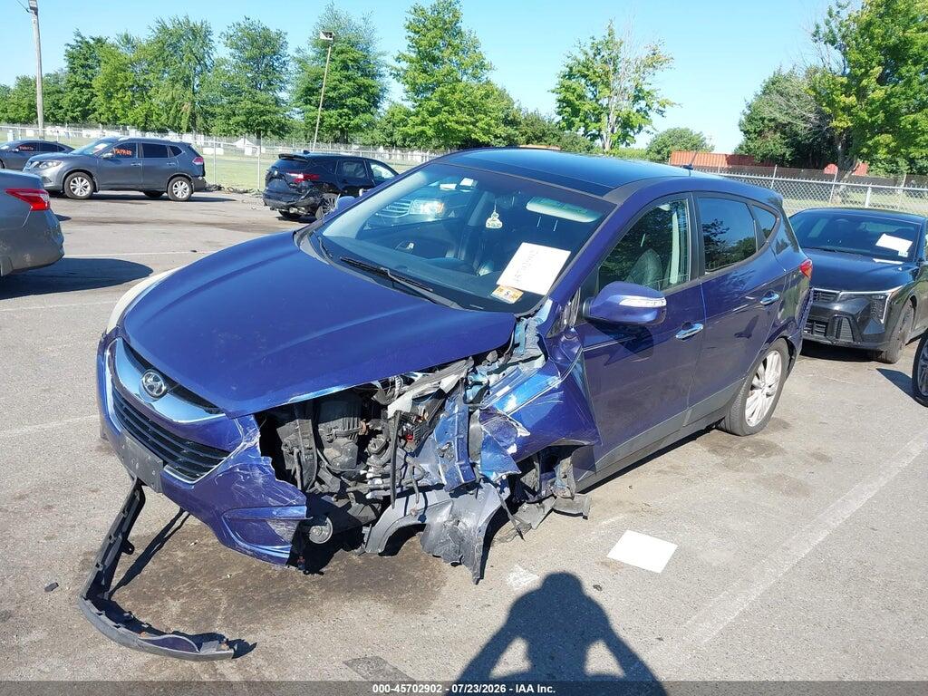 KM8JUCAC4DU690476 2013 HYUNDAI TUCSON photo no. 2