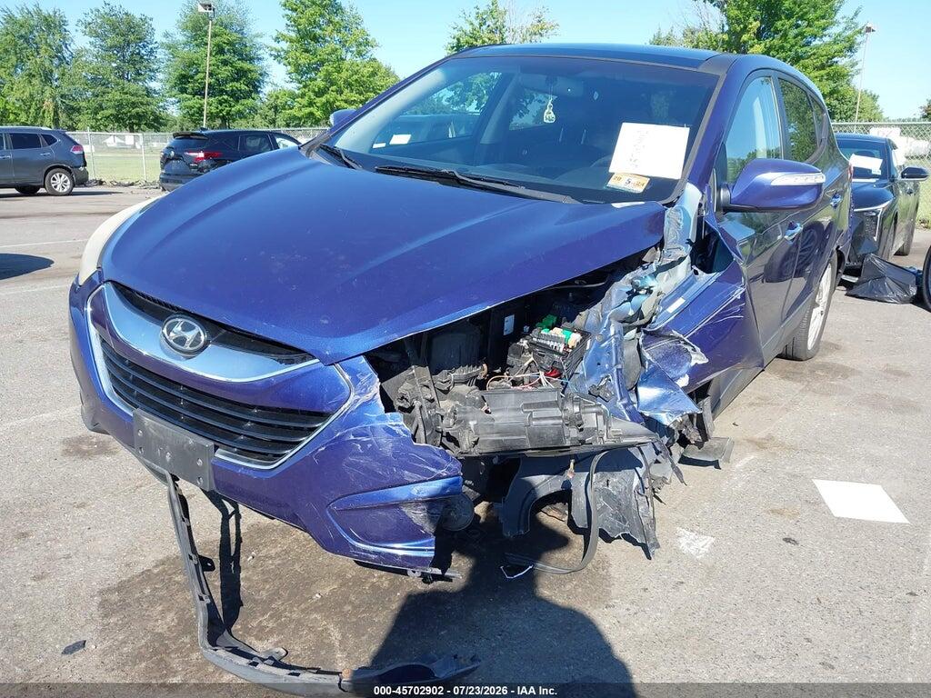 KM8JUCAC4DU690476 2013 HYUNDAI TUCSON photo no. 6