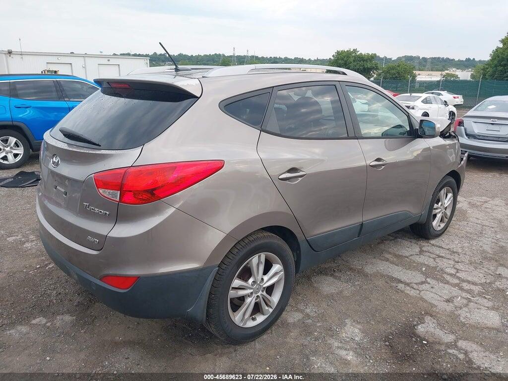KM8JUCAC0DU565815 2013 HYUNDAI TUCSON photo no. 4