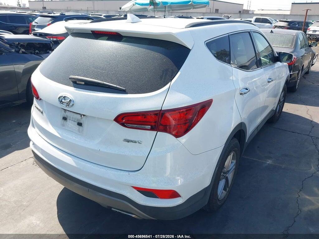 5NMZU3LB9JH053484 2018 HYUNDAI SANTA FE SPORT photo no. 4
