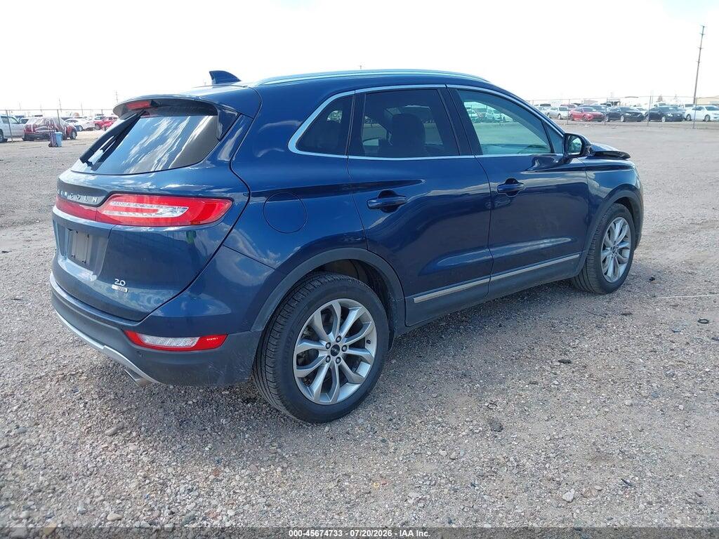 5LMCJ1A95FUJ29195 2015 LINCOLN MKC photo no. 4