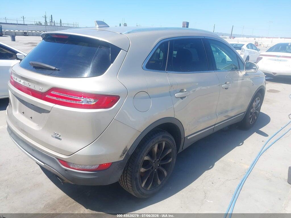 5LMCJ1A90FUJ47149 2015 LINCOLN MKC photo no. 4
