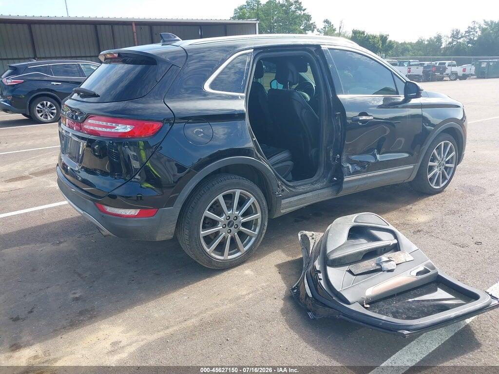 5LMCJ3C90KUL00423 2019 LINCOLN MKC photo no. 4