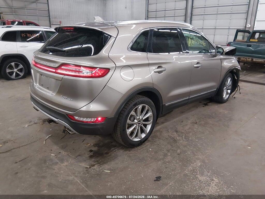 5LMCJ2D90JUL04690 2018 LINCOLN MKC photo no. 4