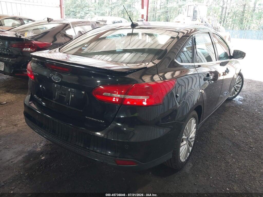 1FADP3J22HL329569 2017 FORD FOCUS photo no. 4