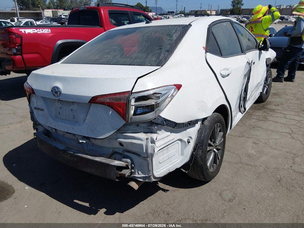 5YFBURHE5JP809986 2018 TOYOTA COROLLA photo no. 4