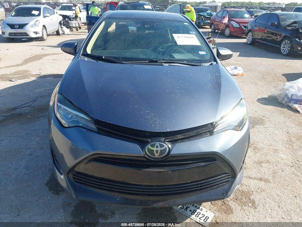 5YFBURHE7JP830631 2018 TOYOTA COROLLA photo no. 12