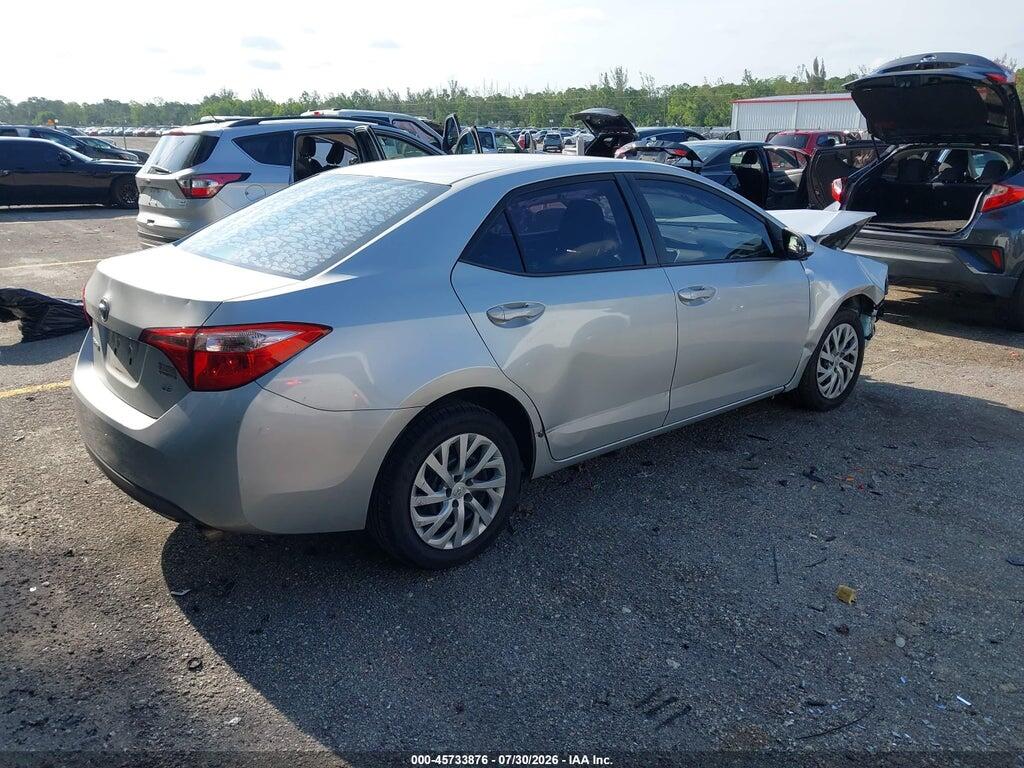 5YFBURHE3JP775515 2018 TOYOTA COROLLA photo no. 4