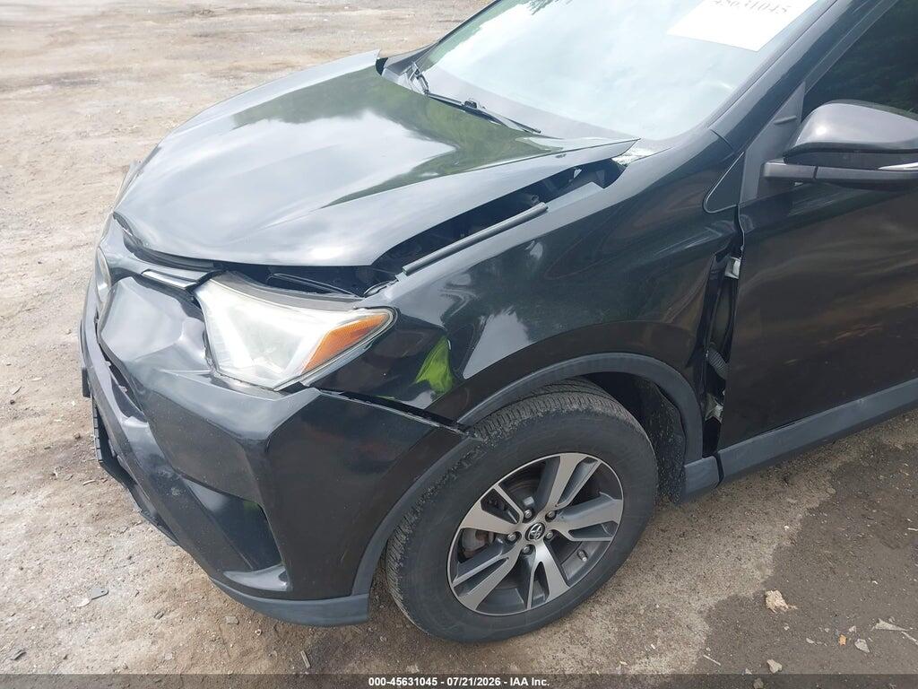 2T3RFREV8JW788974 2018 TOYOTA RAV4 photo no. 6