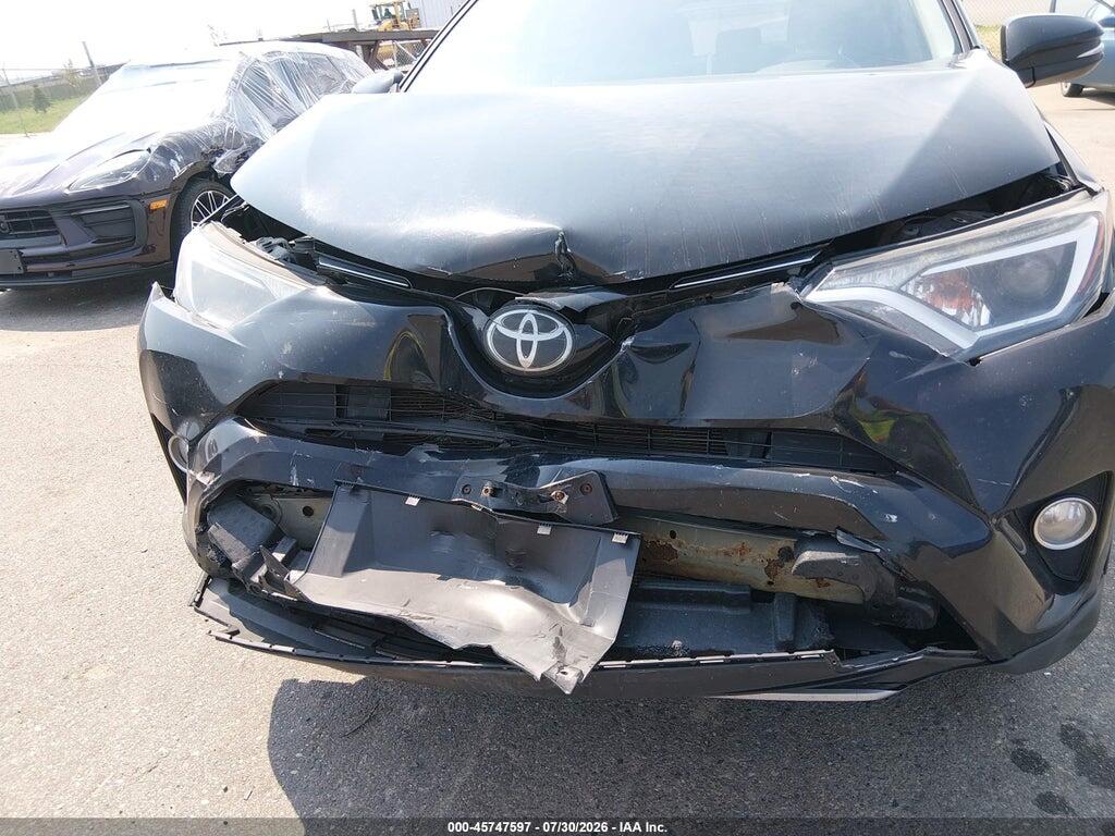 2T3RFREV8JW803232 2018 TOYOTA RAV4 photo no. 6