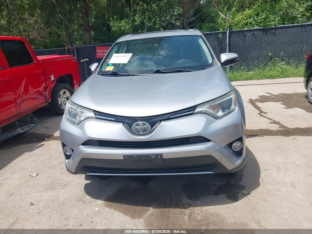 2T3RFREV4JW816785 2018 TOYOTA RAV4 photo no. 12