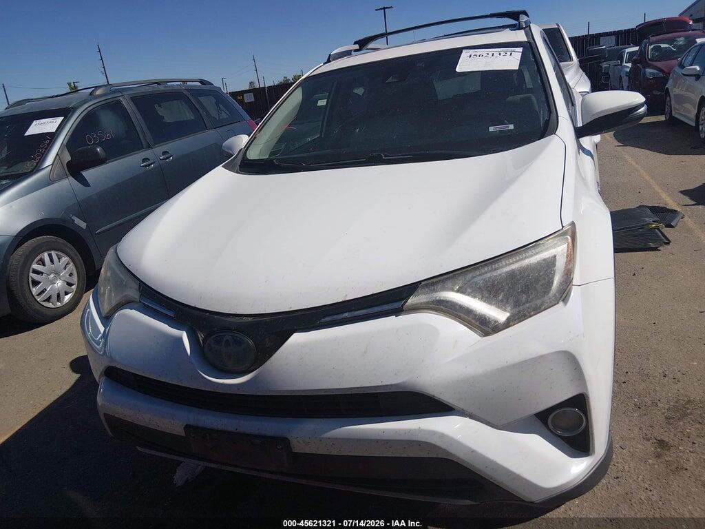 JTMRJREV2JD242277 2018 TOYOTA RAV4 HYBRID photo no. 12
