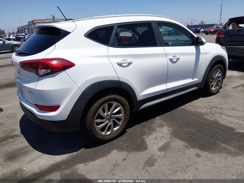 KM8J3CA49HU446565 2017 HYUNDAI TUCSON photo no. 4