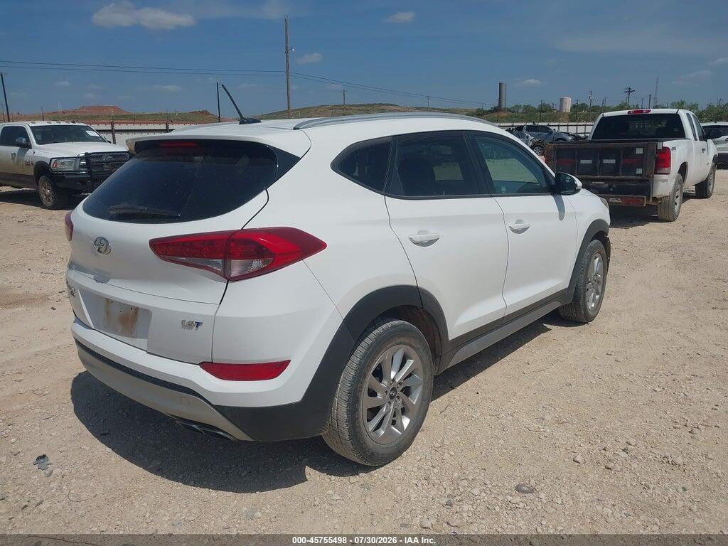 KM8J33A26HU308058 2017 HYUNDAI TUCSON photo no. 4