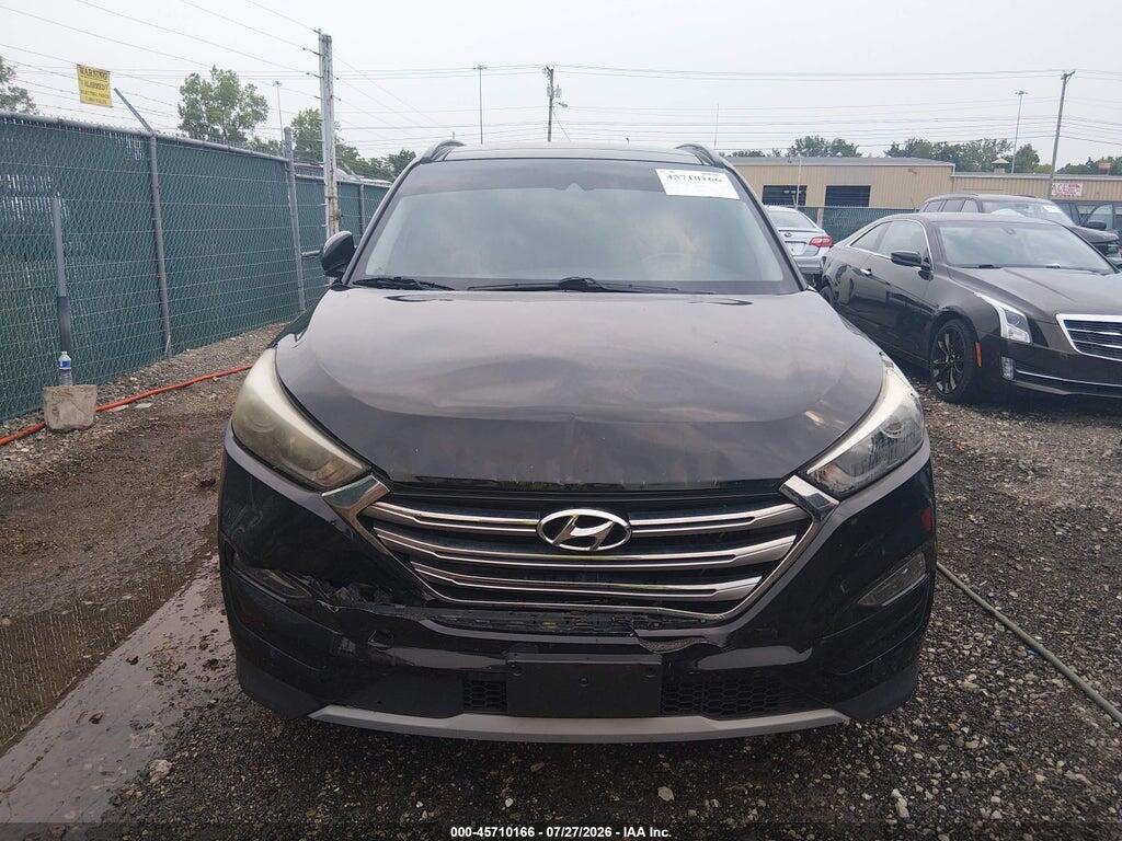 KM8J3CA2XHU351835 2017 HYUNDAI TUCSON photo no. 12