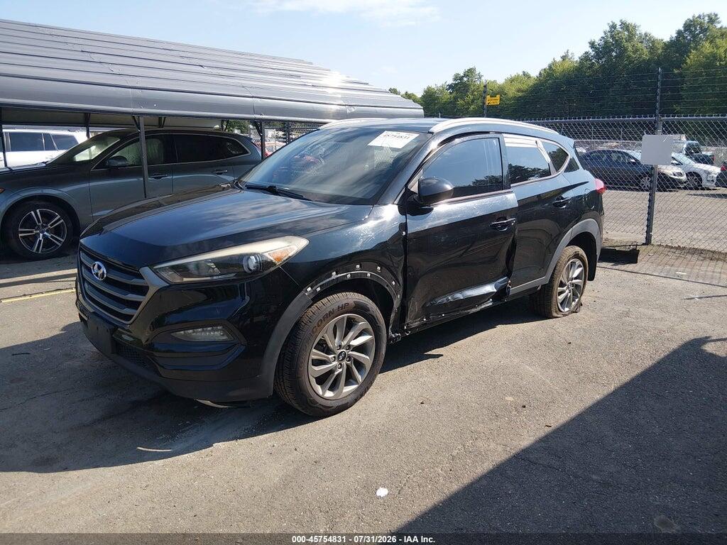 KM8J3CA44GU212316 2016 HYUNDAI TUCSON photo no. 2