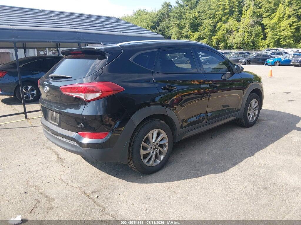 KM8J3CA44GU212316 2016 HYUNDAI TUCSON photo no. 4