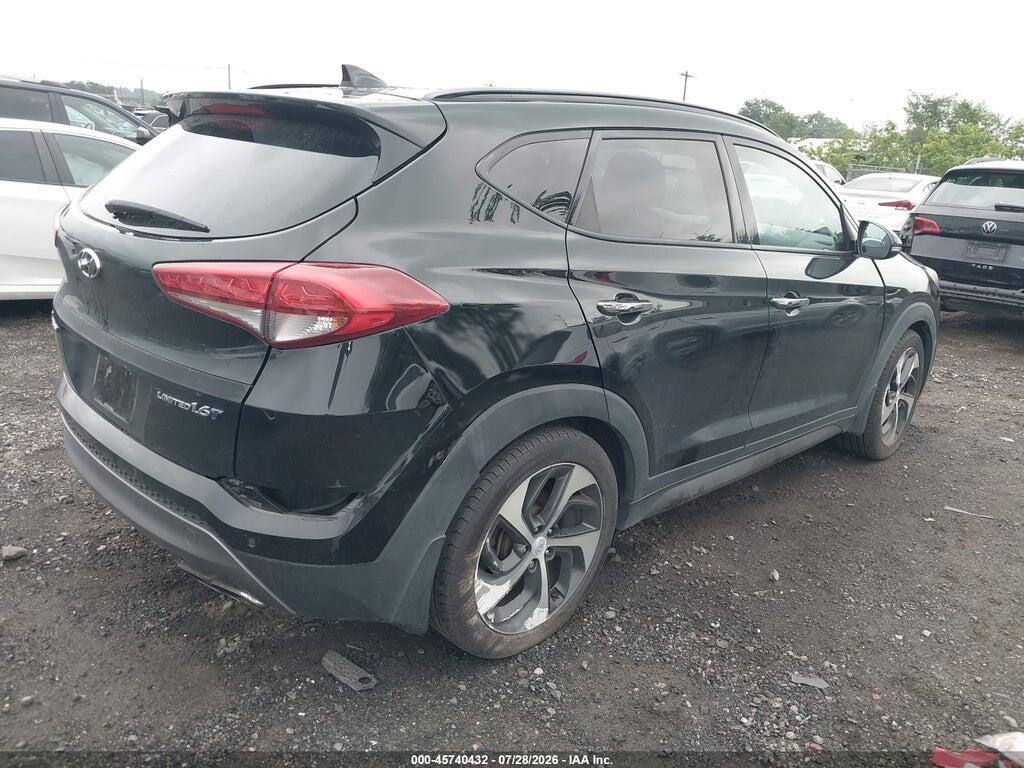 KM8J33A29GU248016 2016 HYUNDAI TUCSON photo no. 4