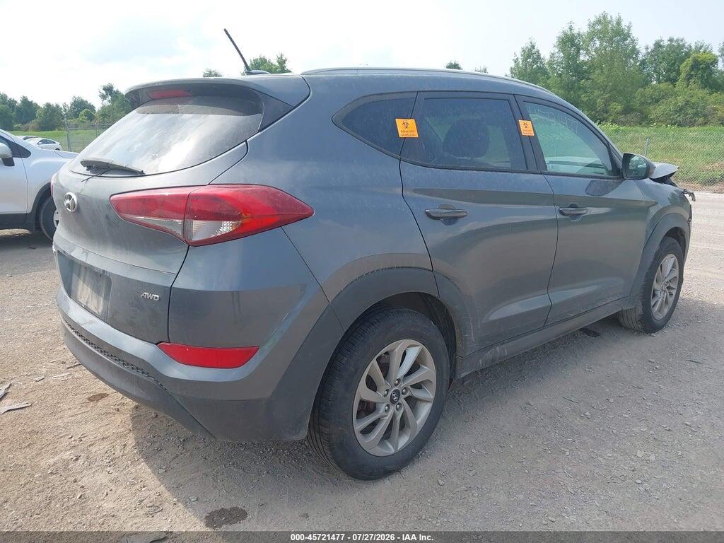 KM8J3CA49GU074014 2016 HYUNDAI TUCSON photo no. 4