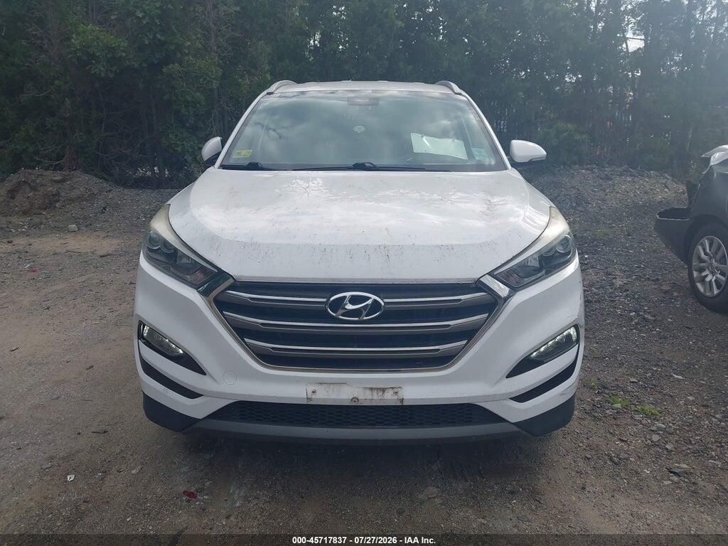 KM8J3CA27GU121622 2016 HYUNDAI TUCSON photo no. 12