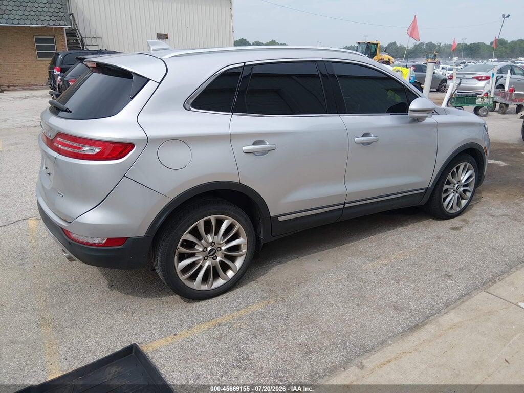 5LMCJ3C97HUL12416 2017 LINCOLN MKC photo no. 4