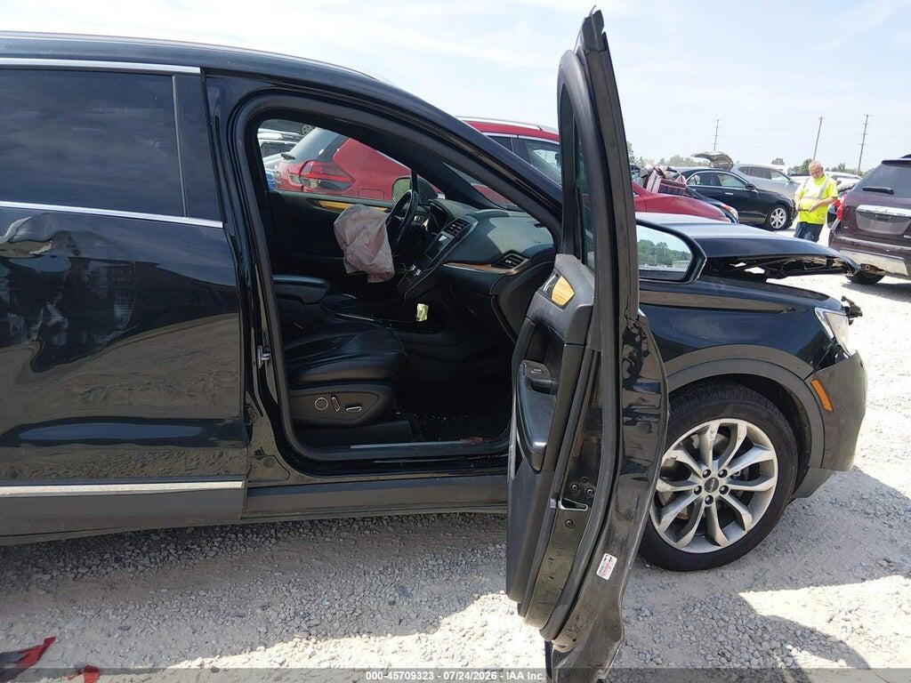 5LMCJ2D97GUJ10909 2016 LINCOLN MKC photo no. 5