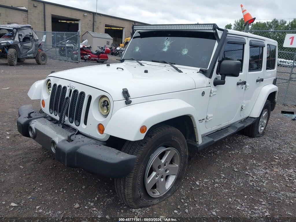 1J4BA3H12BL616928 2011 JEEP WRANGLER UNLIMITED photo no. 2