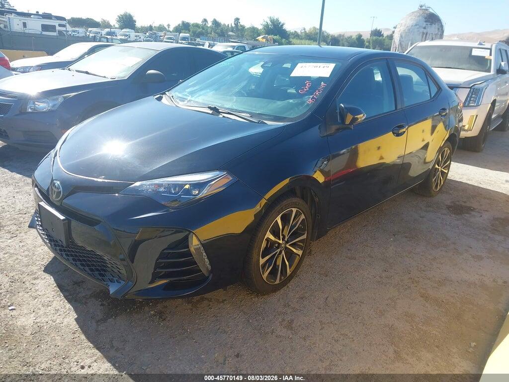 5YFBURHE8HP714929 2017 TOYOTA COROLLA photo no. 2