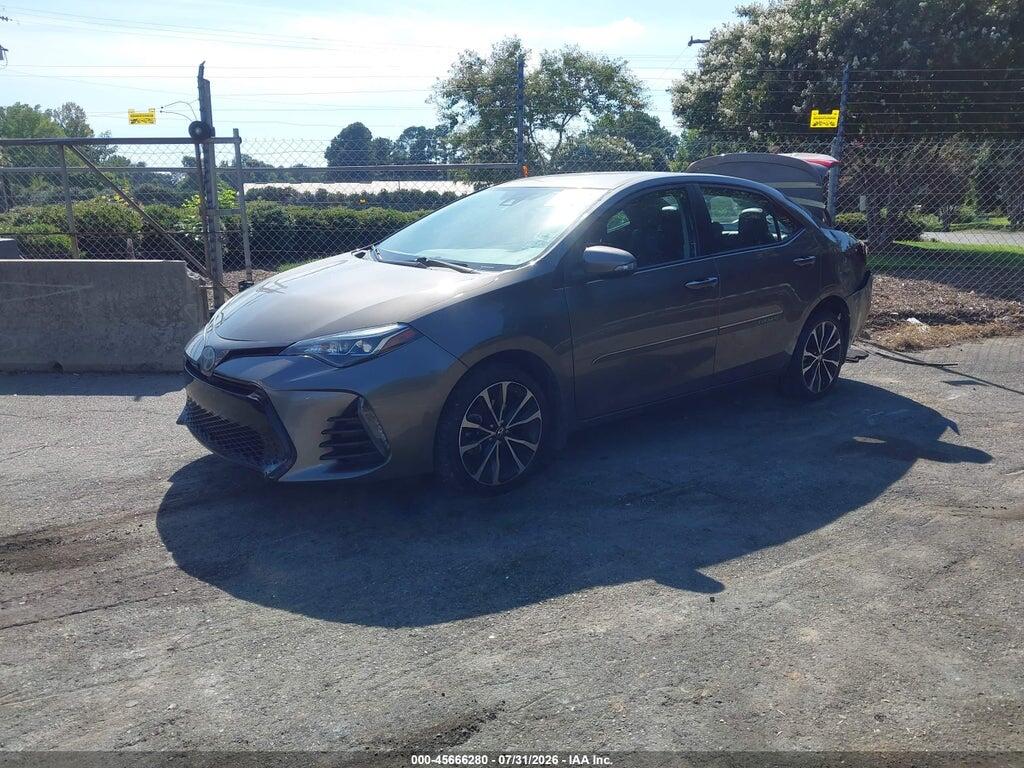 5YFBURHE6HP734015 2017 TOYOTA COROLLA photo no. 2