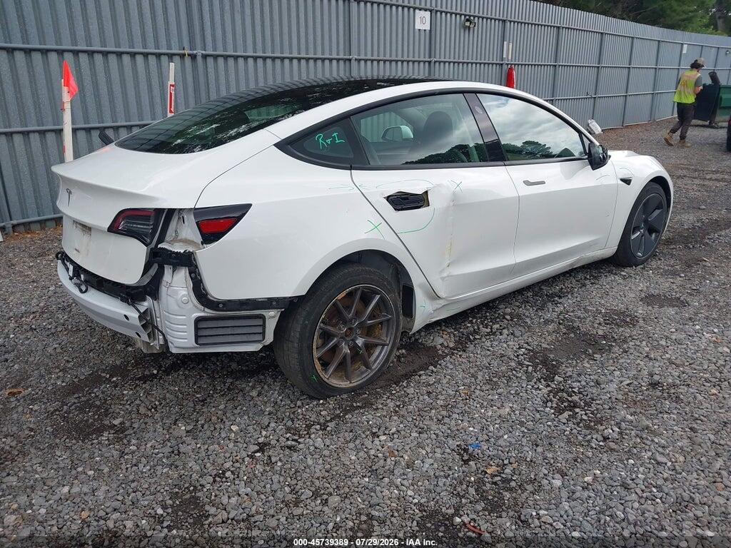 5YJ3E1EA2PF499384 2023 TESLA MODEL 3 photo no. 4