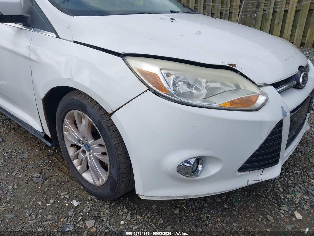 1FAHP3M28CL393606 2012 FORD FOCUS photo no. 6