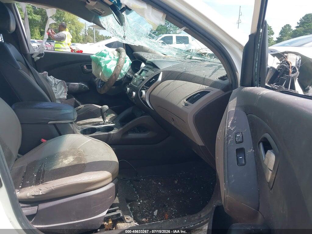 KM8JU3AC7CU339754 2012 HYUNDAI TUCSON photo no. 5
