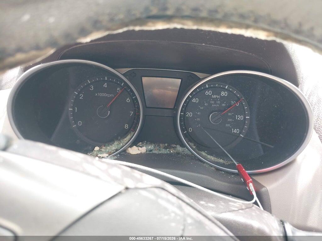 KM8JU3AC7CU339754 2012 HYUNDAI TUCSON photo no. 7