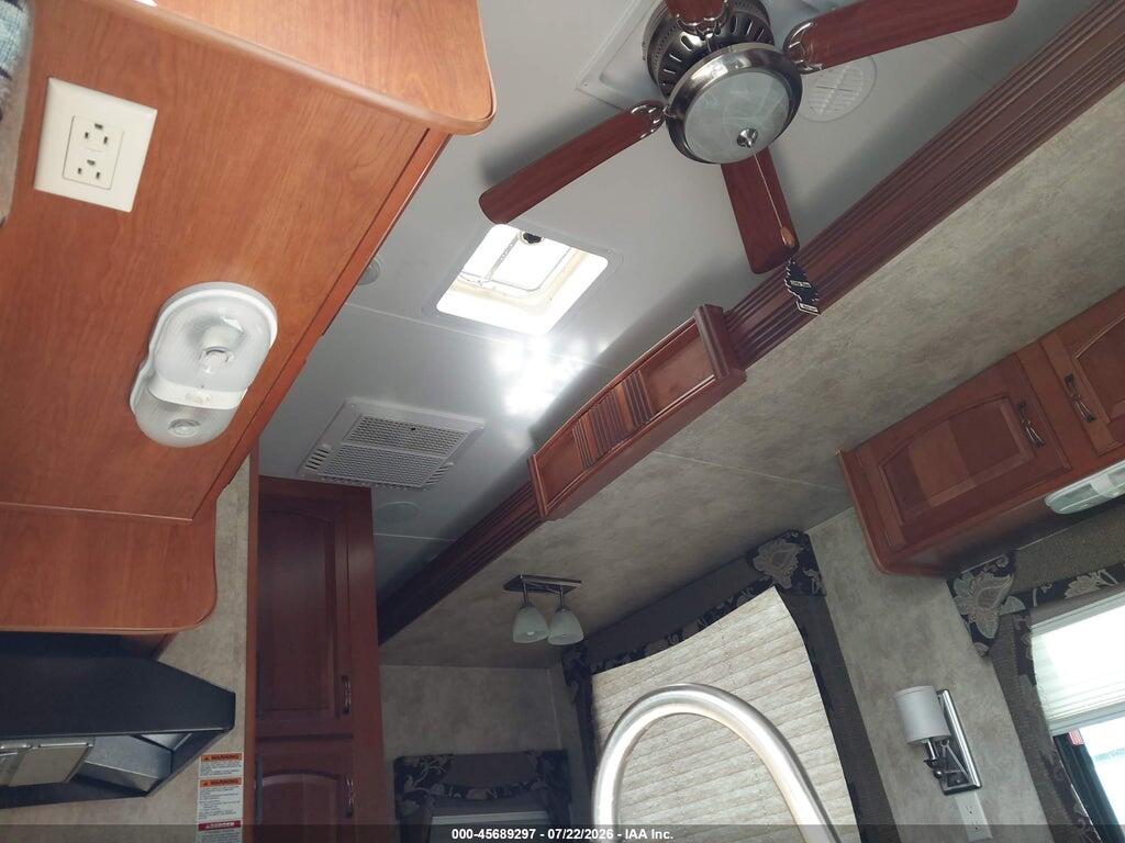 4YDF34127CE760648 2012 KEYSTONE AVALANCHE 5TH WHEEL photo no. 6