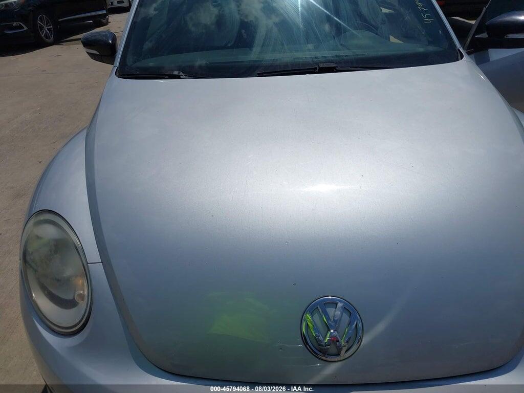 3VWV67AT2CM617551 2012 VOLKSWAGEN BEETLE photo no. 6