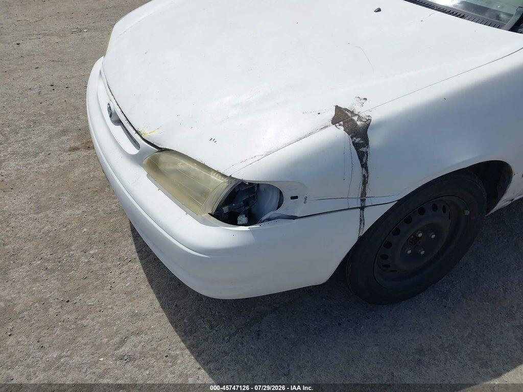 1NXBR12E2YZ412854 2000 TOYOTA COROLLA photo no. 12