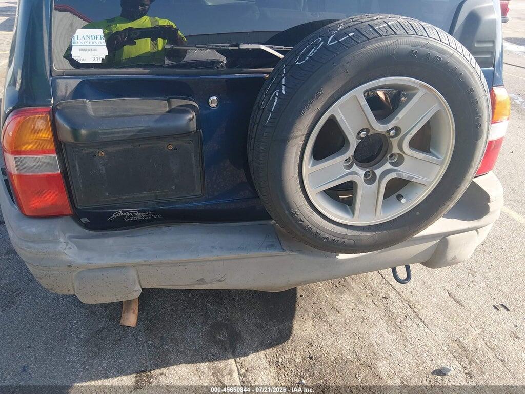 2CNBE13CX36950797 2003 CHEVROLET TRACKER photo no. 6