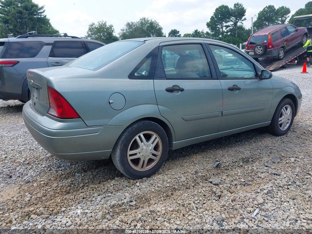 1FAFP34303W307235 2003 FORD FOCUS photo no. 4