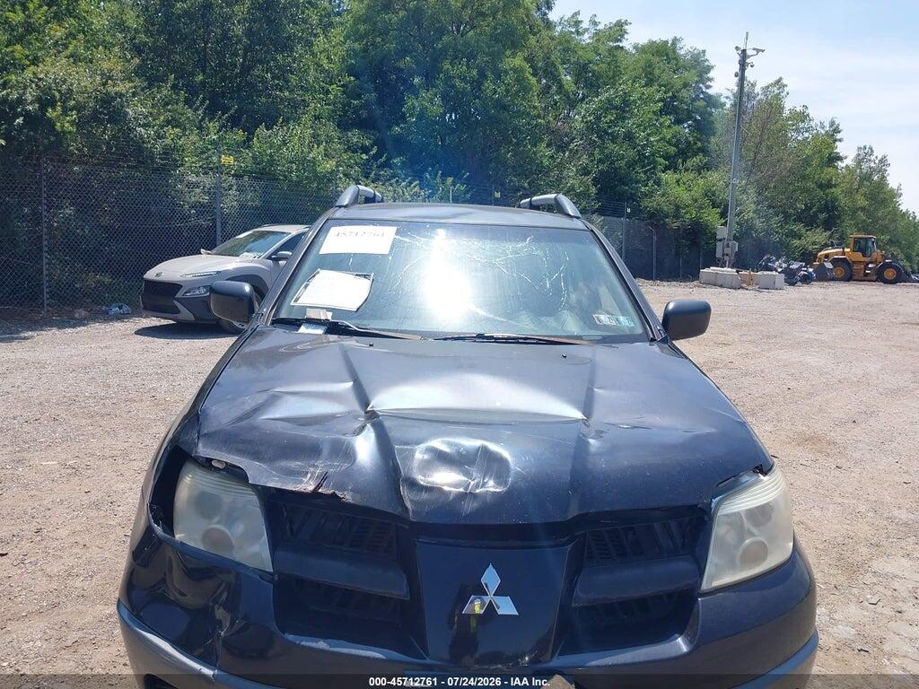 JA4LZ31F06U001202 2006 MITSUBISHI OUTLANDER photo no. 10